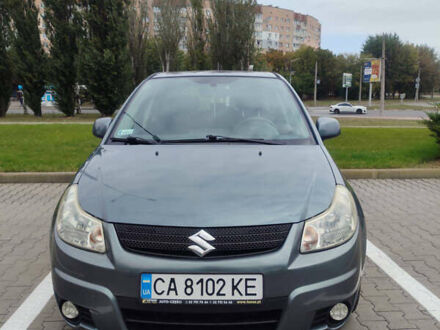 Серый Сузуки СХ4, объемом двигателя 1.59 л и пробегом 232 тыс. км за 6100 $, фото 1 на Automoto.ua