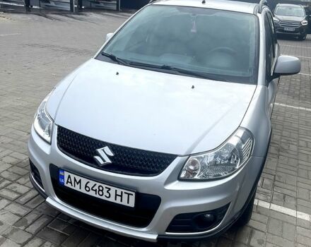 Серый Сузуки СХ4, объемом двигателя 1.6 л и пробегом 245 тыс. км за 8900 $, фото 1 на Automoto.ua