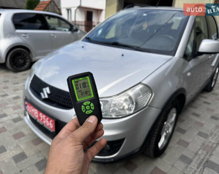 Серый Сузуки СХ4, объемом двигателя 1.6 л и пробегом 160 тыс. км за 8700 $, фото 1 на Automoto.ua