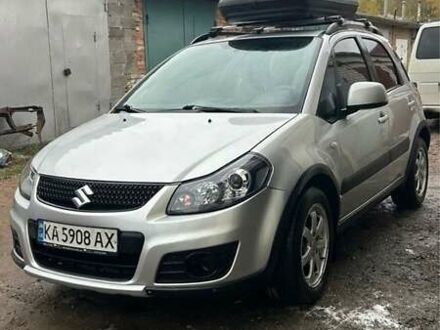 Серый Сузуки СХ4, объемом двигателя 1.6 л и пробегом 243 тыс. км за 7000 $, фото 1 на Automoto.ua