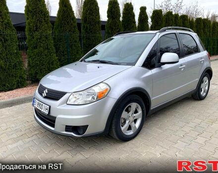 Серый Сузуки СХ4, объемом двигателя 2 л и пробегом 128 тыс. км за 8000 $, фото 1 на Automoto.ua