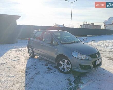 Серый Сузуки СХ4, объемом двигателя 1.6 л и пробегом 260 тыс. км за 5800 $, фото 1 на Automoto.ua