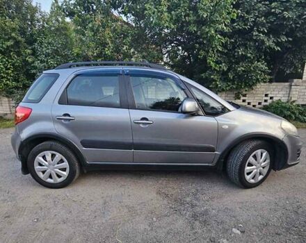 Сірий Сузукі СХ4, об'ємом двигуна 1.59 л та пробігом 142 тис. км за 10300 $, фото 1 на Automoto.ua
