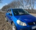 Синий Сузуки СХ4, объемом двигателя 1.59 л и пробегом 299 тыс. км за 6100 $, фото 1 на Automoto.ua