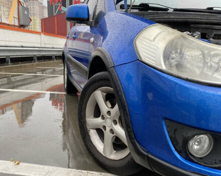 Синий Сузуки СХ4, объемом двигателя 1.59 л и пробегом 286 тыс. км за 4999 $, фото 20 на Automoto.ua