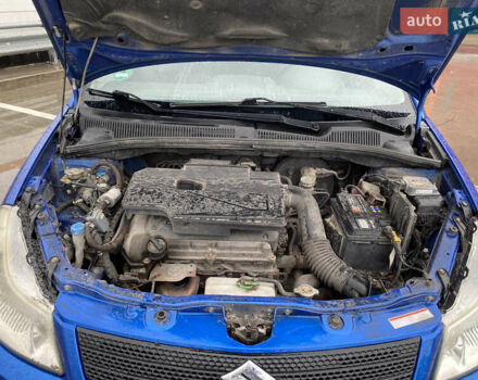 Синий Сузуки СХ4, объемом двигателя 1.59 л и пробегом 286 тыс. км за 4999 $, фото 23 на Automoto.ua