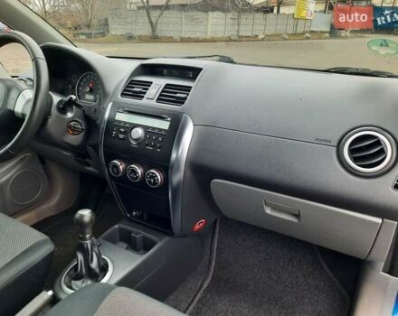 Синий Сузуки СХ4, объемом двигателя 1.6 л и пробегом 174 тыс. км за 6300 $, фото 92 на Automoto.ua