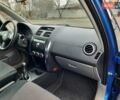 Синий Сузуки СХ4, объемом двигателя 1.6 л и пробегом 174 тыс. км за 6300 $, фото 91 на Automoto.ua