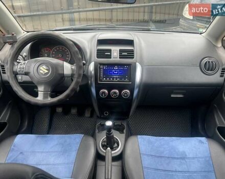 Синий Сузуки СХ4, объемом двигателя 1.56 л и пробегом 227 тыс. км за 5990 $, фото 12 на Automoto.ua