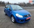 Синий Сузуки СХ4, объемом двигателя 1.6 л и пробегом 174 тыс. км за 6300 $, фото 1 на Automoto.ua