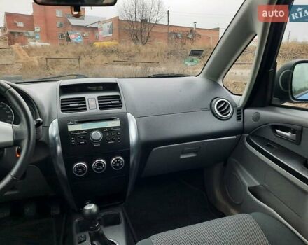 Синий Сузуки СХ4, объемом двигателя 1.6 л и пробегом 174 тыс. км за 6300 $, фото 53 на Automoto.ua
