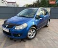 Синий Сузуки СХ4, объемом двигателя 1.59 л и пробегом 225 тыс. км за 5850 $, фото 1 на Automoto.ua