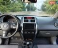 Синий Сузуки СХ4, объемом двигателя 1.59 л и пробегом 173 тыс. км за 5950 $, фото 11 на Automoto.ua
