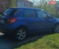 Синий Сузуки СХ4, объемом двигателя 1.59 л и пробегом 174 тыс. км за 4300 $, фото 1 на Automoto.ua