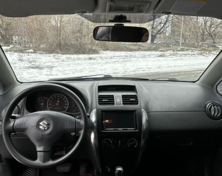 Синий Сузуки СХ4, объемом двигателя 1.6 л и пробегом 315 тыс. км за 4600 $, фото 12 на Automoto.ua