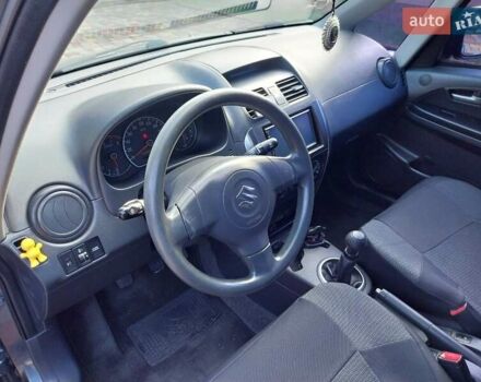 Синий Сузуки СХ4, объемом двигателя 1.59 л и пробегом 114 тыс. км за 4200 $, фото 13 на Automoto.ua