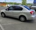 Синий Сузуки СХ4, объемом двигателя 1.6 л и пробегом 225 тыс. км за 5999 $, фото 1 на Automoto.ua