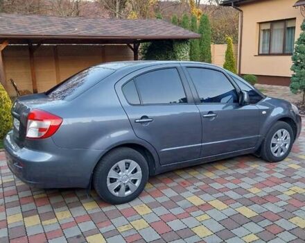 Синий Сузуки СХ4, объемом двигателя 1.59 л и пробегом 114 тыс. км за 4200 $, фото 12 на Automoto.ua