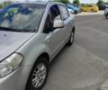 Синий Сузуки СХ4, объемом двигателя 1.6 л и пробегом 225 тыс. км за 5999 $, фото 2 на Automoto.ua