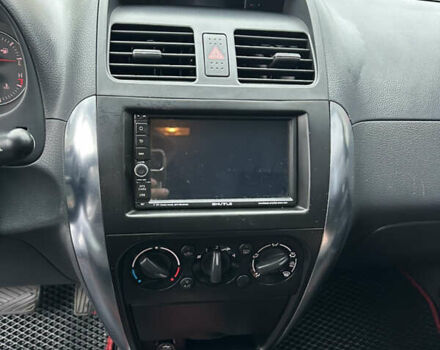 Синий Сузуки СХ4, объемом двигателя 1.6 л и пробегом 315 тыс. км за 4600 $, фото 11 на Automoto.ua