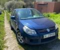 Синий Сузуки СХ4, объемом двигателя 1.6 л и пробегом 300 тыс. км за 6400 $, фото 1 на Automoto.ua