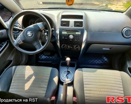 Синий Сузуки СХ4, объемом двигателя 1.6 л и пробегом 166 тыс. км за 8300 $, фото 3 на Automoto.ua