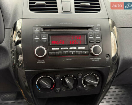 Синий Сузуки СХ4, объемом двигателя 2 л и пробегом 210 тыс. км за 7450 $, фото 14 на Automoto.ua