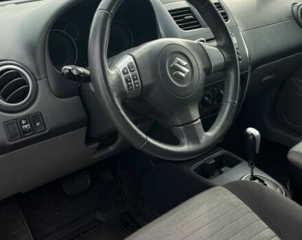 Синий Сузуки СХ4, объемом двигателя 1.6 л и пробегом 138 тыс. км за 9300 $, фото 7 на Automoto.ua