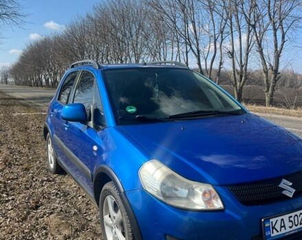 Синий Сузуки СХ4, объемом двигателя 1.59 л и пробегом 299 тыс. км за 5750 $, фото 1 на Automoto.ua