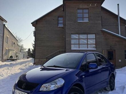 Синий Сузуки СХ4, объемом двигателя 1.6 л и пробегом 317 тыс. км за 5199 $, фото 1 на Automoto.ua