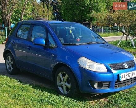 Синий Сузуки СХ4, объемом двигателя 1.59 л и пробегом 174 тыс. км за 4300 $, фото 1 на Automoto.ua