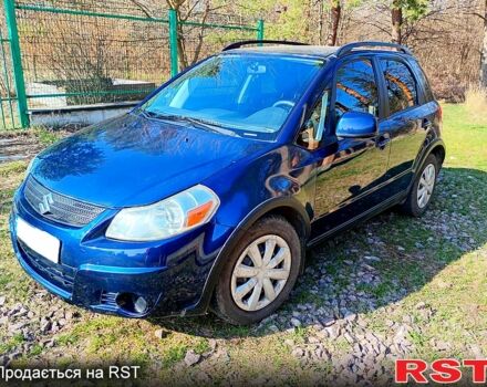 Синий Сузуки СХ4, объемом двигателя 2 л и пробегом 142 тыс. км за 6999 $, фото 1 на Automoto.ua