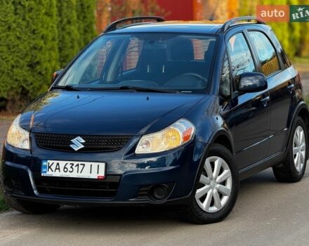 Синий Сузуки СХ4, объемом двигателя 2 л и пробегом 129 тыс. км за 9200 $, фото 1 на Automoto.ua