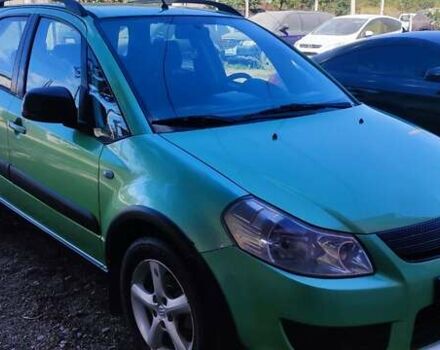 Зеленый Сузуки СХ4, объемом двигателя 1.59 л и пробегом 275 тыс. км за 4800 $, фото 5 на Automoto.ua