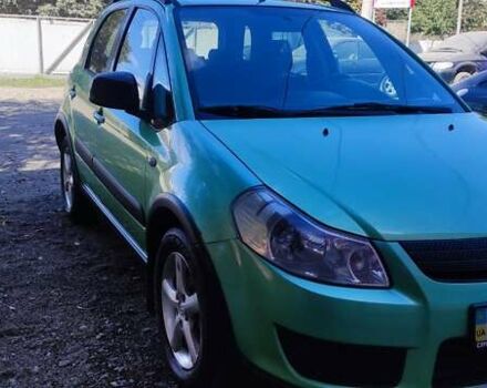 Зеленый Сузуки СХ4, объемом двигателя 1.59 л и пробегом 275 тыс. км за 4800 $, фото 6 на Automoto.ua