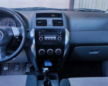 Зеленый Сузуки СХ4, объемом двигателя 1.59 л и пробегом 275 тыс. км за 4800 $, фото 13 на Automoto.ua