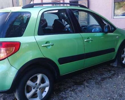 Зеленый Сузуки СХ4, объемом двигателя 1.59 л и пробегом 275 тыс. км за 4800 $, фото 2 на Automoto.ua