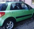Зеленый Сузуки СХ4, объемом двигателя 1.59 л и пробегом 275 тыс. км за 4800 $, фото 2 на Automoto.ua