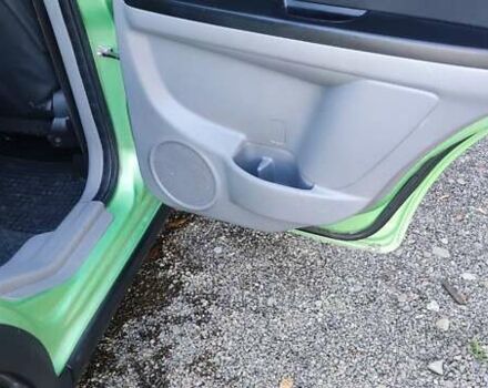 Зеленый Сузуки СХ4, объемом двигателя 1.59 л и пробегом 275 тыс. км за 4800 $, фото 11 на Automoto.ua