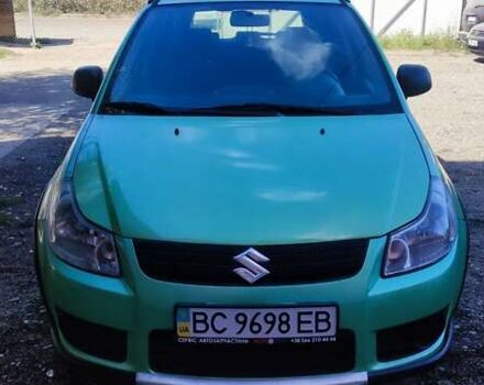 Зеленый Сузуки СХ4, объемом двигателя 1.59 л и пробегом 275 тыс. км за 4800 $, фото 3 на Automoto.ua