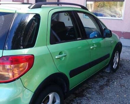 Зеленый Сузуки СХ4, объемом двигателя 1.59 л и пробегом 275 тыс. км за 4800 $, фото 8 на Automoto.ua