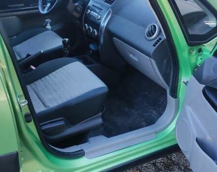 Зеленый Сузуки СХ4, объемом двигателя 1.59 л и пробегом 275 тыс. км за 4800 $, фото 15 на Automoto.ua