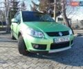 Зеленый Сузуки СХ4, объемом двигателя 1.6 л и пробегом 205 тыс. км за 4900 $, фото 1 на Automoto.ua