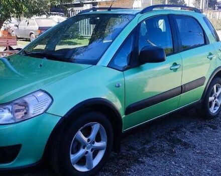 Зеленый Сузуки СХ4, объемом двигателя 1.59 л и пробегом 275 тыс. км за 4800 $, фото 1 на Automoto.ua