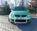 Зеленый Сузуки СХ4, объемом двигателя 1.6 л и пробегом 205 тыс. км за 4900 $, фото 1 на Automoto.ua