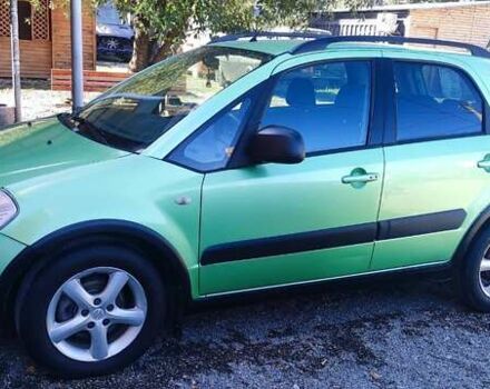 Зеленый Сузуки СХ4, объемом двигателя 1.59 л и пробегом 275 тыс. км за 4800 $, фото 4 на Automoto.ua