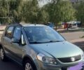 Зеленый Сузуки СХ4, объемом двигателя 1.6 л и пробегом 80 тыс. км за 11700 $, фото 1 на Automoto.ua
