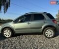 Зелений Сузукі СХ4, об'ємом двигуна 1.6 л та пробігом 224 тис. км за 8800 $, фото 13 на Automoto.ua