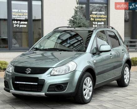Зеленый Сузуки СХ4, объемом двигателя 1.6 л и пробегом 164 тыс. км за 8950 $, фото 2 на Automoto.ua