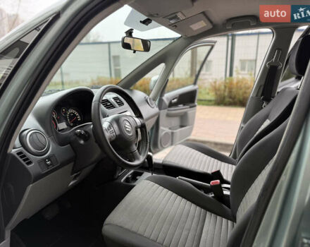 Зеленый Сузуки СХ4, объемом двигателя 1.6 л и пробегом 164 тыс. км за 8950 $, фото 8 на Automoto.ua